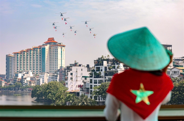 [PHOTOS] Military helicopters, fighter jets in rehearsal flypast over central Hà Nội- Ảnh 5.