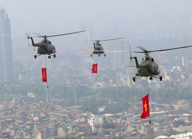 [PHOTOS] Military helicopters, fighter jets in rehearsal flypast over central Hà Nội- Ảnh 3.